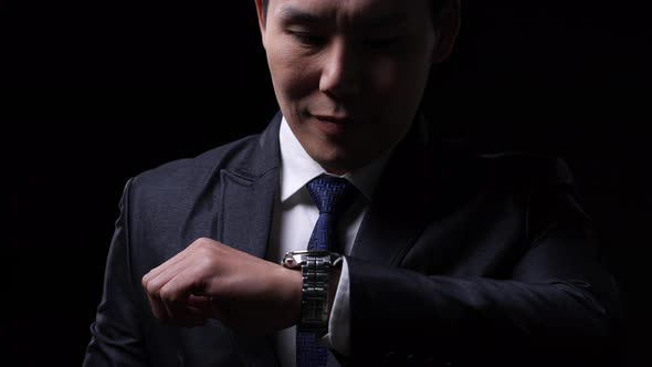 Business man looking modern smart watch