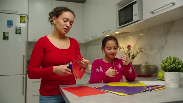Loving Mother Spending Time with Daughter Making Applique at Home alt