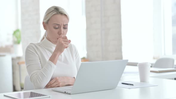Sick Young Businesswoman Having Coughing in Office