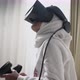 a little girl with hijab playing a game wearing VR glasses - VideoHive Item for Sale