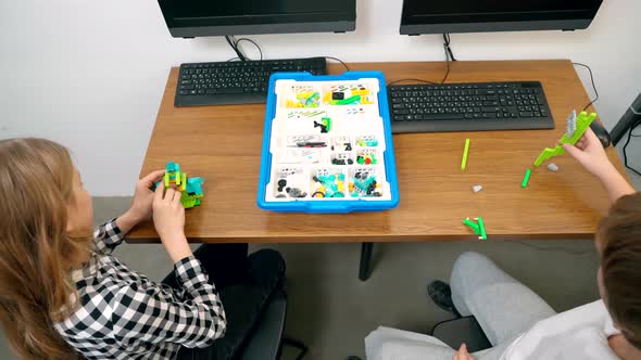 Children Using Building Kit in Classroom