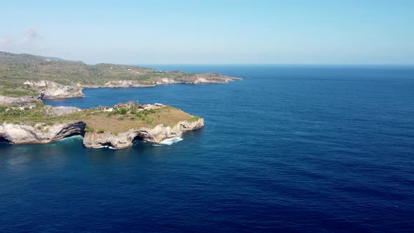 Fly Around Rock Cliff in Tropical Island