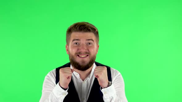 Man Looking at Camera with Anticipation, Then Very Upset, Green Screen