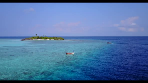 Aerial view scenery of exotic island beach voyage by blue green ocean and white sand background of j