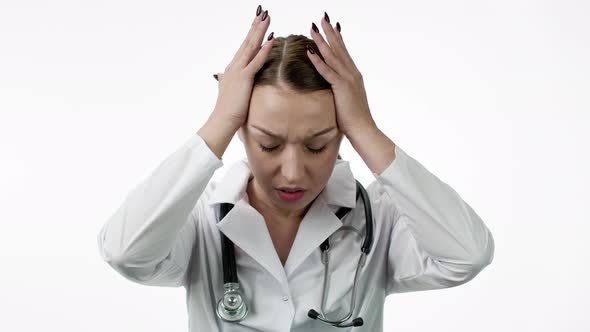 Attractive Female Doctor Is Experiencing Severe Headache and Fatigue, Isolated