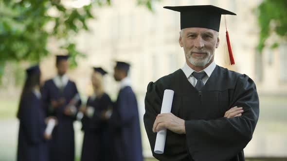 Aged Man in Graduation Outfit, Professor Obtaining New Degree, Academic Career