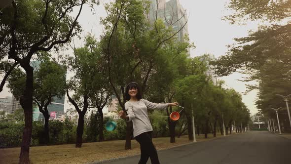 Taiwanese woman playing with a Chinese Yo-Yo