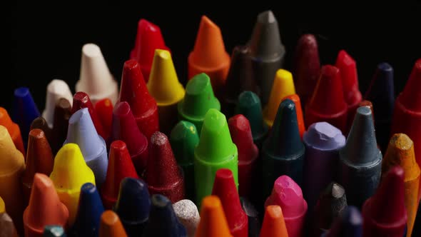 Rotating shot of color wax crayons for drawing and crafts