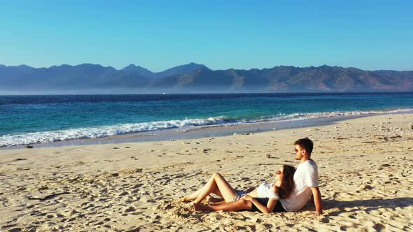 Romantic people married on vacation spend quality time on beach on summer white sandy background 4K