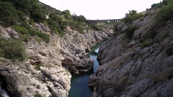 Aerial View of an Ancient Stone Bridge Called Devil's Bridge in South of France