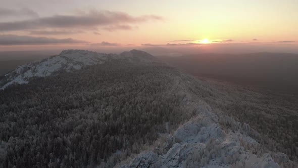 Aerial View of Winter Snow Covered Mountain Peaks and Frozen Trees, Winter Footage