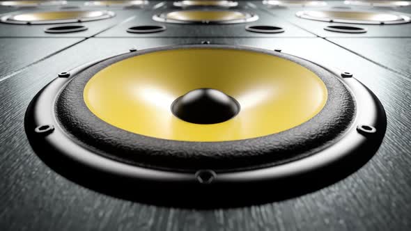 Close-up of Audio Speaker with Yellow Membrane Playing Rhythmic Music Loop