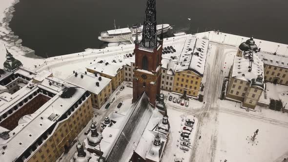 Drone flying backwards in aerial view of famous tourist destination in the capital of Sweden, Stockh