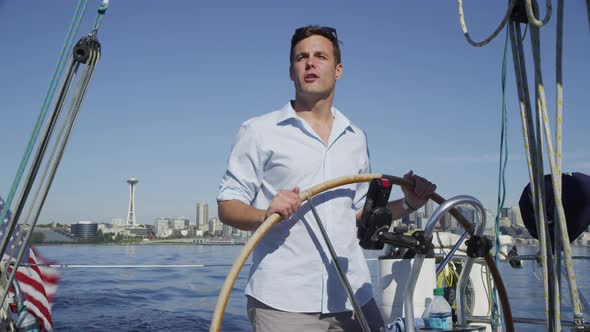 Young couple on sailboat together. Shot on RED EPIC for high quality 4K, UHD, Ultra HD resolution.