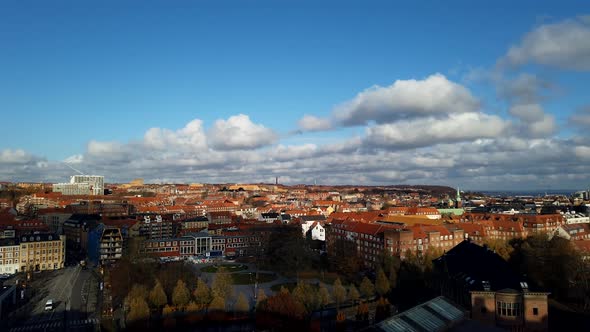 Timelapse on a cloudy day in a Scandinavian city red rooftops