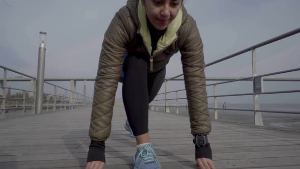 Cheerful Hindu Woman on Start Line Ready To Run