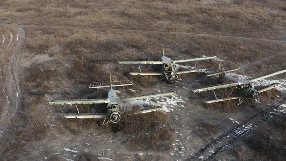 Three Broken Transport Planes  Light Transport Aircrafts Biplanes on the Airfield