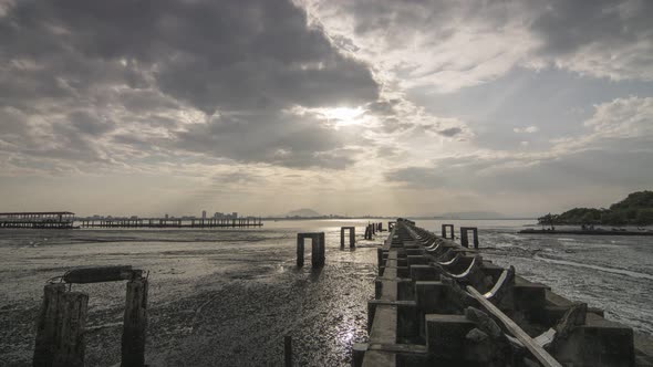 Timelapse of Broken Bridge jetty sunrise with amazing ray and cloud