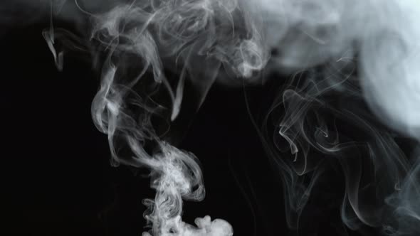 Smoke on black background in slow motion; shot on Phantom Flex 4K at 1000 fps alt