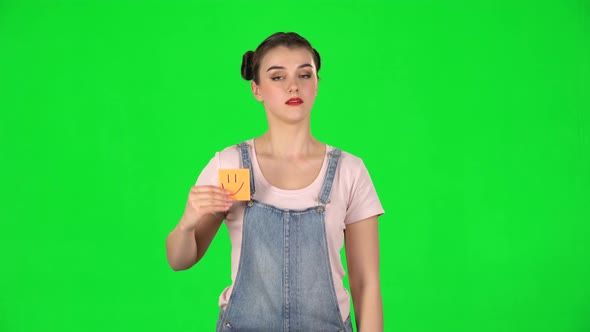 Girl Holding Paper Stick Expressing Awful Mood Then Takes Another Expressing Good Mood