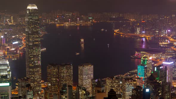 Hong Kong Urban Cityscape Aerial Skyline Panorama Timelapse at Night Pan Up