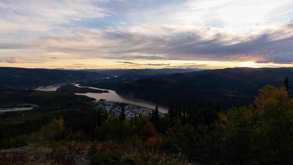 Time Lapse. View of Dawson City Lights From Above at Sunset.