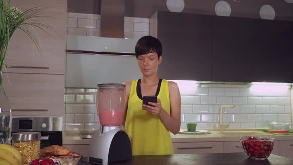 Girl Preparing Drink in Apartment