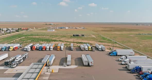 Aerial View of Rest Area for Heavy Trucks with Restaurant and Large Car Park