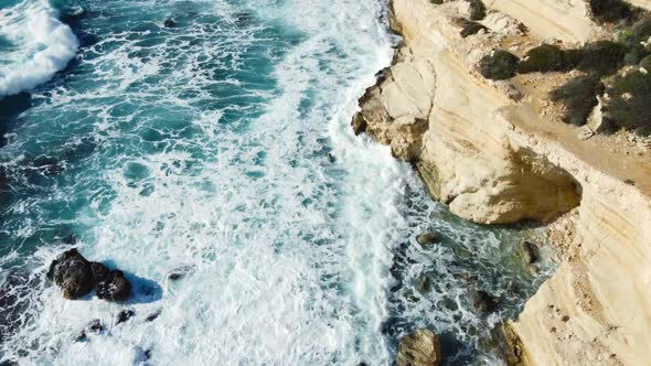 Pure Blue Ocean Water Waves with Light Reflections Crush Mountain at Slow Motion Powerful Storm on