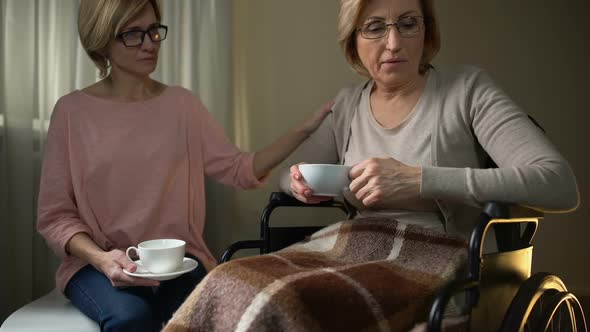 Daughter Visiting Mother in Nursing Home Old Woman Angry About Being Abandoned