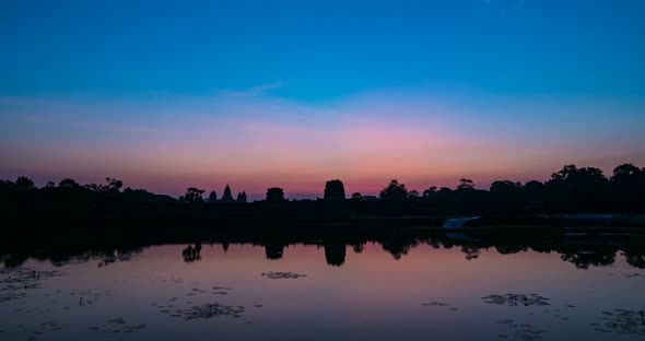 Sunrise time lapse at Angkor Wat main facade silhouette. World famous temple