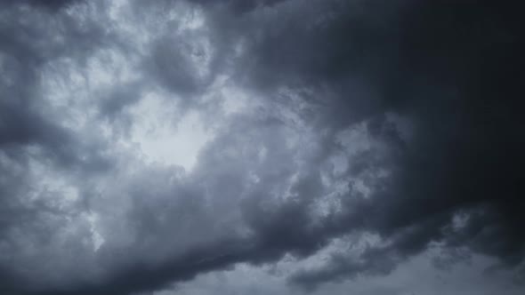 Time lapse storm is coming. Dramatic rain clouds approach the hill