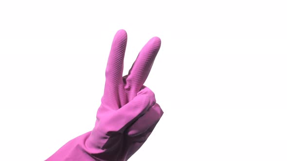 Hand with Purple Rubber Glove is Pointing