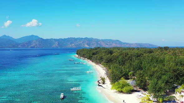 Aerial flying over scenery of paradise sea view beach time by turquoise water and white sand backgro