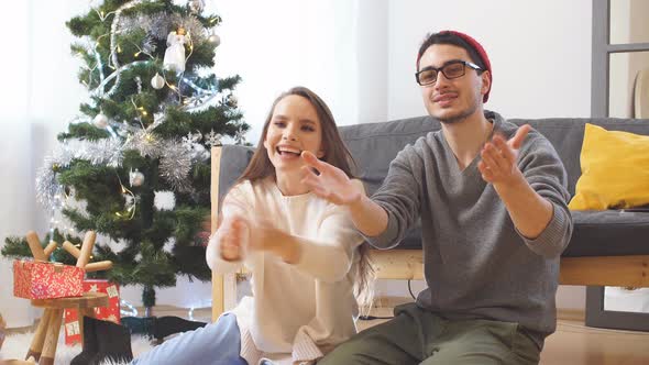 Parents Play with Child Before Christmas.