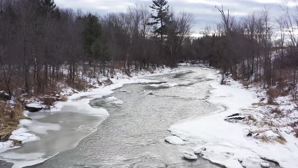 icy winter river mystical beauty low flight upstream