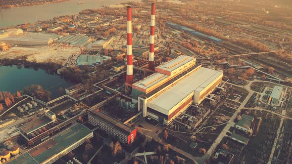 Aerial Drone Flight Footage: Main City Power Plant with Two Factory Chimneys alt