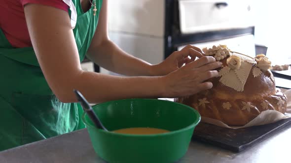 Professional Baker Decorating Wedding Bread