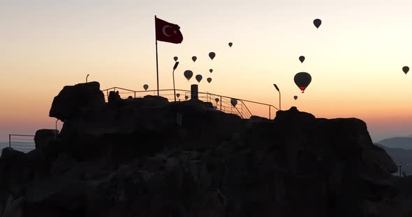 Aerial Cinematic Drone View of Colorful Hot Air Balloon Flying Over Cappadocia