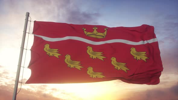 East Sussex Flag England Waving in the Wind Sky and Sun Background