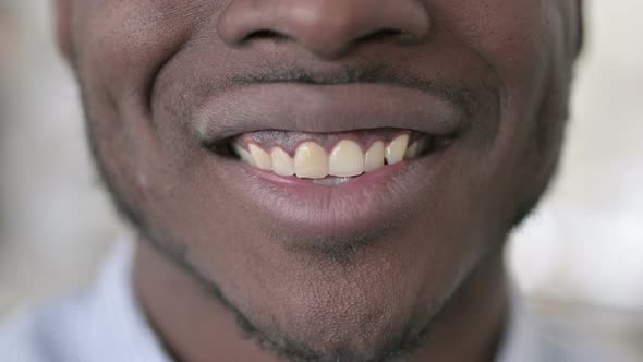 Close Up of Smiling African Man Lips