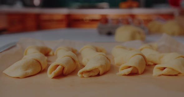 Freshly Made Croissants on Table in Kitchen