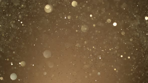 Golden Glitter Background in Super Slow Motion at 1000Fps