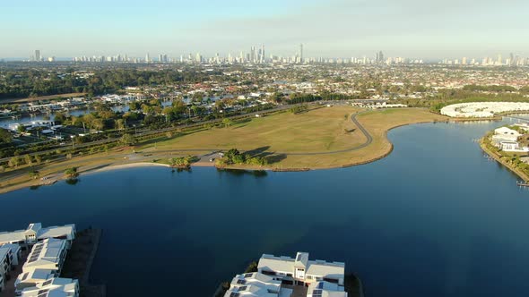 Aerial view over the Gold Coast suburb of Carrara and the still Emerald Lake, Queensland, Australia