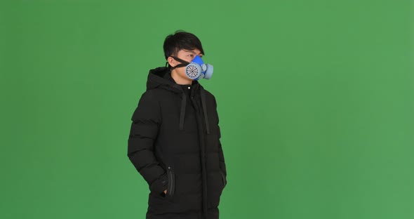 Young Boy In Protective Mask, Green Screen