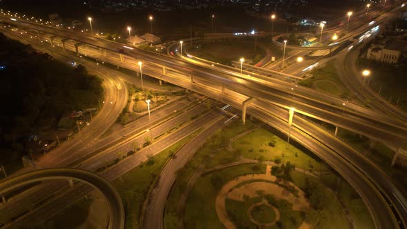 4K : Time lapse Aerial view and top view of traffic on city. Expressway with car lots