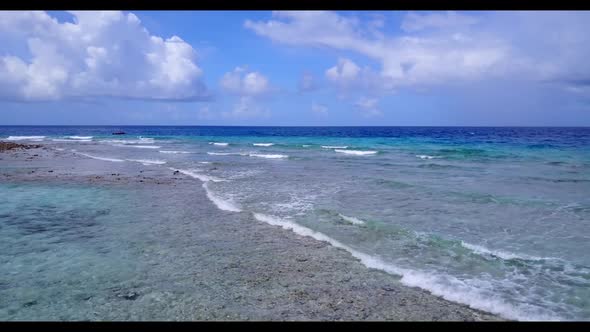 Aerial view nature of tropical resort beach time by shallow ocean with white sand background of a pi