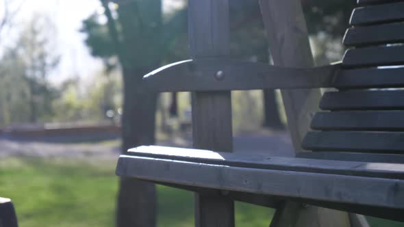 A Closer Look of the Wooden Bench in the Park in Helsinki Finland