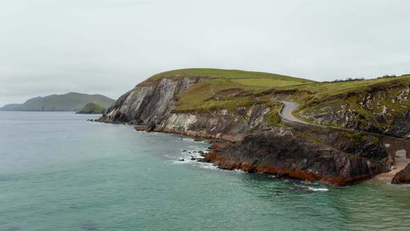 Aerial Footage of Sea Washing Rocky Coast