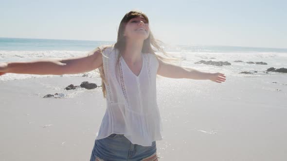 Young woman by the sea